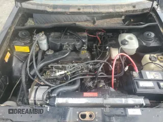 1981 Volkswagen Rabbit z VIN 1VWBG9170BV152464, wystawiony jako Copart lot #81292544 z przebiegiem 122 944 mil mil oraz Tytuł czysty. Historia ofert i sprzedaży dostępna na DreamBid. Obrazek 11.