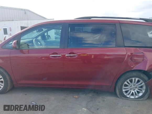 2014 Toyota Sienna XLE with VIN 5TDYK3DCXES442968, listed as a IAAI auction lot 41241310 with 132,020 mi miles and . Bid and sale history available at DreamBid. Image 14.