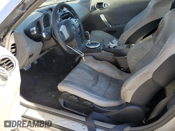 2004 Nissan 350Z Touring z VIN JN1AZ34E94T062960, wystawiony jako Copart lot #55822235 z przebiegiem 186 879 mil mil oraz Szkoda całkowita • Salvage title. Historia ofert i sprzedaży dostępna na DreamBid. Obrazek 7.