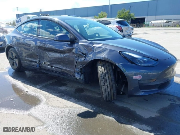 2023 Tesla Model 3 with VIN 5YJ3E1EA0PF698076, listed as a IAAI auction lot 41744362 with 12,838 mi miles. Bid and sale history available at carsss.com. Image 1.