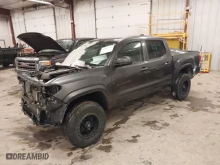2021 Toyota Tacoma 4WD SR with VIN 3TMCZ5AN4MM402567, listed as a IAAI auction lot 41549414 with 54,270 mi miles. Bid and sale history available at carsss.com. Image 2.