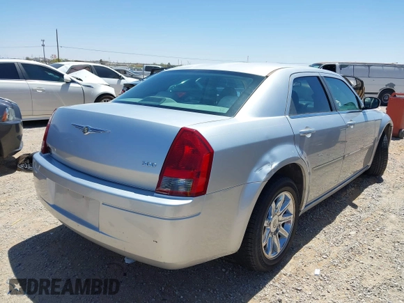 2007 Chrysler 300 with VIN 2C3KA43RX7H664582, listed as a IAAI auction lot 42106297 with 141,866 mi miles and . Bid and sale history available at DreamBid. Image 4.