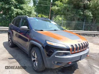 2014 Jeep Cherokee Trailhawk z VIN 1C4PJMBS4EW291673, wystawiony jako IAAI lot #42407611 z przebiegiem 93 368 mil mil oraz . Historia ofert i sprzedaży dostępna na DreamBid. Obrazek 1.