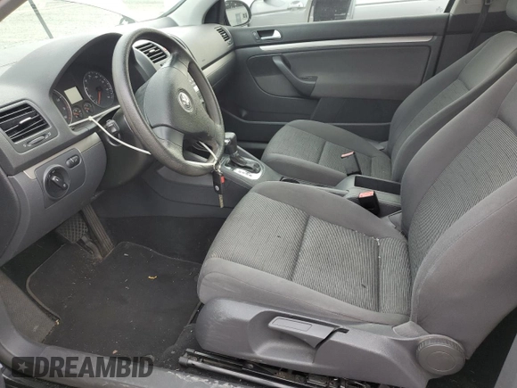 2009 Volkswagen Rabbit S with VIN WVWBB71K89W037593, listed as a Copart auction lot 74941614 with 51,645 mi miles and Salvage title. Bid and sale history available at DreamBid. Image 7.