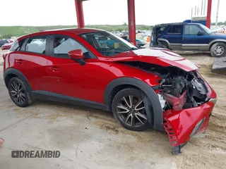 2017 Mazda CX-3 Touring z VIN JM1DKFC78H0153678, wystawiony jako IAAI lot #42446170 z przebiegiem 111 436 mil mil oraz . Historia ofert i sprzedaży dostępna na DreamBid. Obrazek 13.