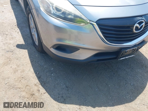 2015 Mazda CX-9 Sport z VIN JM3TB2BA3F0451593, wystawiony jako IAAI lot #42870124 z przebiegiem 196 390 mil mil oraz . Historia ofert i sprzedaży dostępna na DreamBid. Obrazek 6.