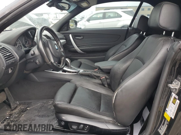 2013 BMW 1 Series 135i with VIN WBAUN7C58DVM26978, listed as a Copart auction lot 77974834 with 0 mi miles and Clean Title. Bid and sale history available at carsss.com. Image 7.