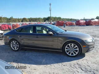2016 Audi A7 3.0 Premium Plus with VIN WAUWGAFC2GN105498, listed as a IAAI auction lot 41488062 with 120,393 mi miles. Bid and sale history available at carsss.com. Image 13.