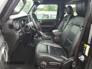 2020 Jeep Wrangler Unlimited Sahara with VIN 1C4HJXEG9LW337590, listed as a Copart auction lot 59197125 with 57,733 mi miles and Salvage title. Bid and sale history available at DreamBid. Image 7.