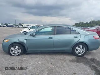 2007 Toyota Camry CE with VIN 4T1BE46K37U569515, listed as a IAAI auction lot 41974482 with 242,042 mi miles. Bid and sale history available at carsss.com. Image 14.