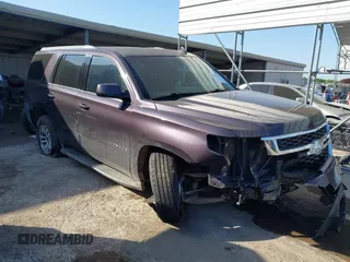 2015 Chevrolet Tahoe LS z VIN 1GNSCAKCXFR628303, wystawiony jako IAAI lot #42002698 z przebiegiem 152 141 mil mil oraz . Historia ofert i sprzedaży dostępna na DreamBid. Obrazek 1.