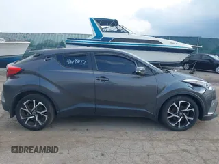 2018 Toyota C-HR XLE z VIN NMTKHMBX3JR009064, wystawiony jako IAAI lot #42095817 z przebiegiem 105 467 mil mil oraz . Historia ofert i sprzedaży dostępna na DreamBid. Obrazek 13.