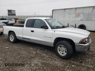 2001 Dodge Dakota Sport with VIN 1B7GL22N01S284441, listed as a Copart auction lot 83486504 with 114,613 mi miles and Salvage Title. Bid and sale history available at carsss.com. Image 4.