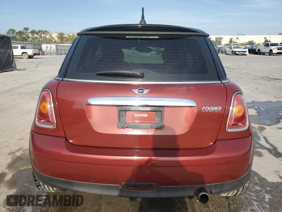 2007 MINI Hardtop with VIN WMWMF33577TT52975, listed as a Copart auction lot 53909855 with 127,325 mi miles and Salvage title. Bid and sale history available at DreamBid. Image 6.
