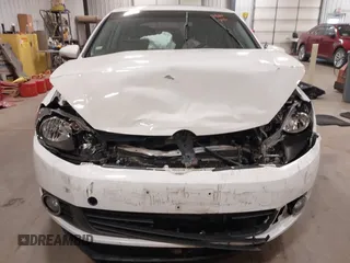 2012 Volkswagen Golf TDI z VIN WVWDM7AJ9CW296921, wystawiony jako IAAI lot #42070028 z przebiegiem 113 511 mil mil oraz . Historia ofert i sprzedaży dostępna na DreamBid. Obrazek 13.