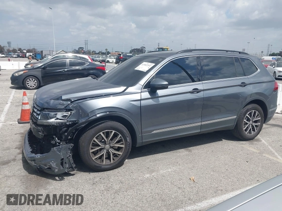 2020 Volkswagen Tiguan SE with VIN 3VV3B7AX9LM061569, listed as a IAAI auction lot 41902252 with 33,079 mi miles and . Bid and sale history available at DreamBid. Image 14.