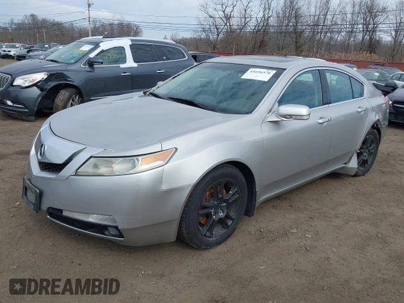 2009 Acura TL Tech with VIN 19UUA86519A013039, listed as a IAAI auction lot 41656570 with 241,217 mi miles. Bid and sale history available at carsss.com. Image 2.