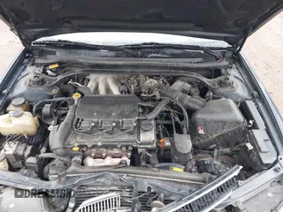 1999 Toyota Solara SE with VIN 2T1CF22P9XC113933, listed as a IAAI auction lot 41975806 with 239,883 mi miles. Bid and sale history available at carsss.com. Image 10.
