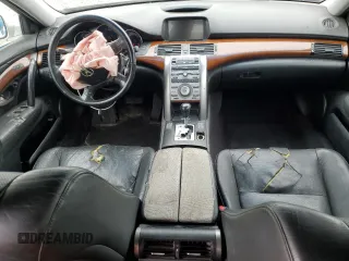 2005 Acura RL z VIN JH4KB16515C011475, wystawiony jako Copart lot #57517545 z przebiegiem 254 459 mil mil oraz Nie do naprawy. Historia ofert i sprzedaży dostępna na DreamBid. Obrazek 8.