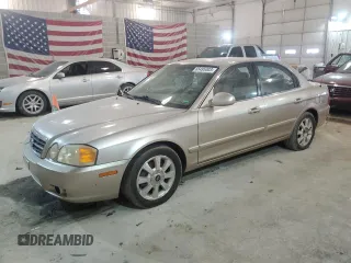 2006 Kia Optima LX z VIN KNAGD128455389275, wystawiony jako Copart lot #45363524 z przebiegiem 181 056 mil mil oraz Nie do naprawy • Non repairable. Historia ofert i sprzedaży dostępna na DreamBid. Obrazek 1.