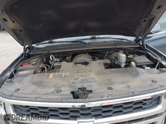 2020 Chevrolet Suburban LT z VIN 1GNSKHKC2LR259315, wystawiony jako IAAI lot #42129791 z przebiegiem 72 979 mil mil oraz . Historia ofert i sprzedaży dostępna na DreamBid. Obrazek 10.