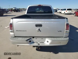 2006 Mitsubishi Raider z VIN 1Z3HC48N56S540531, wystawiony jako Copart lot #80794064 z przebiegiem 136 616 mil mil oraz Czysty tytuł • Clean title. Historia ofert i sprzedaży dostępna na DreamBid. Obrazek 6.