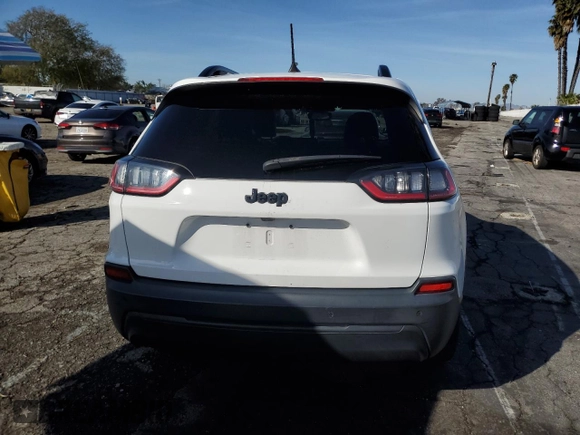 2021 Jeep Cherokee Altitude with VIN 1C4PJLLB1MD112671, listed as a Copart auction lot 44832295 with 72,356 mi miles and Salvage Title. Bid and sale history available at carsss.com. Image 6.