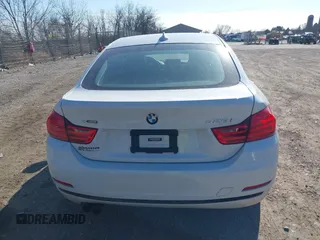 2016 BMW 4 Series 428i xDrive with VIN WBA4C9C59GG138090, listed as a IAAI auction lot 41560267 with 94,010 mi miles and . Bid and sale history available at carsss.com. Image 16.
