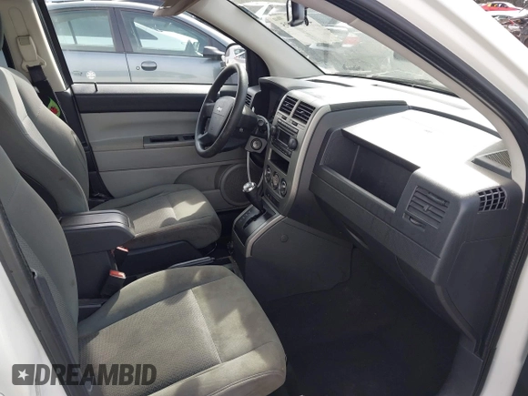 2007 Jeep Compass Sport with VIN 1J8FT47W77D145745, listed as a IAAI auction lot 41687495 with 218,231 mi miles. Bid and sale history available at carsss.com. Image 5.
