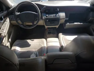 2003 Cadillac DeVille z VIN 1G6KD54Y93U258835, wystawiony jako Copart lot #52595785 z przebiegiem 215 289 mil mil oraz Szkody całkowita. Historia ofert i sprzedaży dostępna na DreamBid. Obrazek 8.