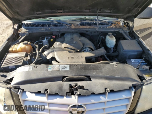 2005 Cadillac Escalade EXT z VIN 3GYEK62N85G111436, wystawiony jako Copart lot #87582245 z przebiegiem Nie podano mil oraz Szkoda całkowita • Salvage title. Historia ofert i sprzedaży dostępna na DreamBid. Obrazek 12.