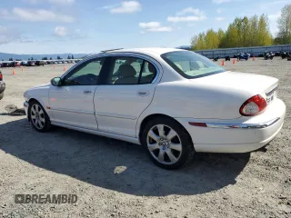 2006 Jaguar X-Type with VIN SAJWA51A06WE68591, listed as a Copart auction lot 53020355 with 179,379 mi miles and Salvage Title. Bid and sale history available at DreamBid. Image 2.