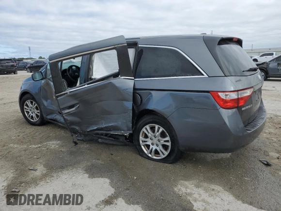2012 Honda Odyssey EX-L with VIN 5FNRL5H63CB038980, listed as a Copart auction lot 41613155 with Not Provided miles and Salvage Title. Bid and sale history available at DreamBid. Image 2.