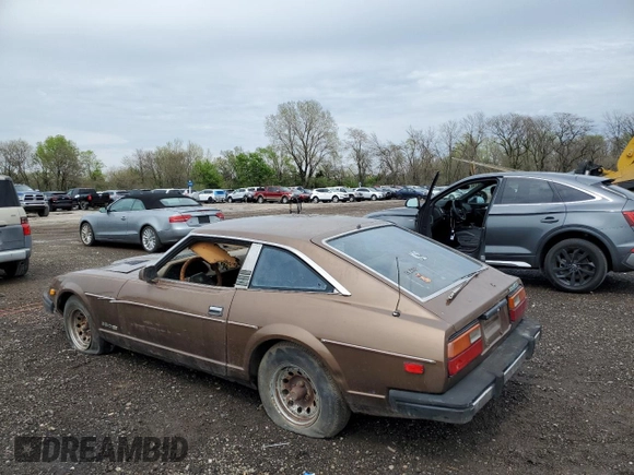 1979 Datsun 280ZX z VIN HGS130115983, wystawiony jako Copart lot #54709755 z przebiegiem 74 026 mil mil oraz Tytuł czysty. Historia ofert i sprzedaży dostępna na DreamBid. Obrazek 2.