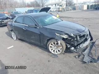 2015 Cadillac CTS Luxury AWD with VIN 1G6AX5SX3F0130311, listed as a IAAI auction lot 41299375 with 134,793 mi miles and . Bid and sale history available at DreamBid. Image 1.