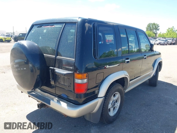 1999 Isuzu Trooper S with VIN JACDJ58X5X7917271, listed as a IAAI auction lot 42308643 with 216,163 mi miles and . Bid and sale history available at DreamBid. Image 4.