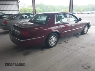 2006 Mercury Grand Marquis LS Premium z VIN 2MEHM75VX6X628404, wystawiony jako IAAI lot #42227639 z przebiegiem 170 132 mil mil oraz . Historia ofert i sprzedaży dostępna na DreamBid. Obrazek 4.