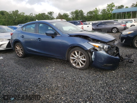 2017 Mazda 3 Touring with VIN 3MZBN1V77HM123452, listed as a Copart auction lot 57786485 with 117,811 mi miles and Salvage title. Bid and sale history available at DreamBid. Image 4.
