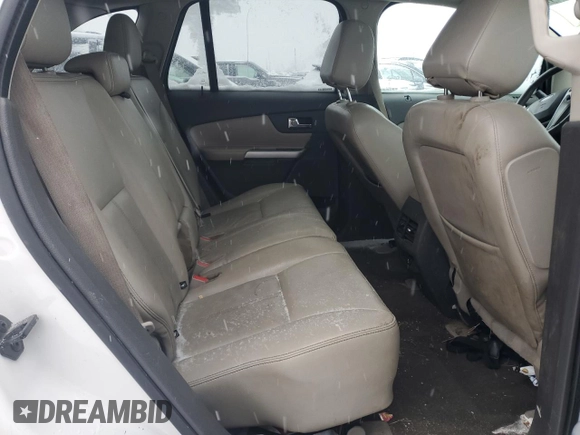 2013 Ford Edge SEL z VIN 2FMDK4JC5DBE10529, wystawiony jako Copart lot #87764785 z przebiegiem 174 813 mil mil oraz Czysty tytuł • Clean title. Historia ofert i sprzedaży dostępna na DreamBid. Obrazek 11.