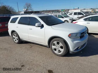2014 Dodge Durango Limited with VIN 1C4RDHDG9EC300790, listed as a IAAI auction lot 41681580 with 132,145 mi miles. Bid and sale history available at carsss.com. Image 1.