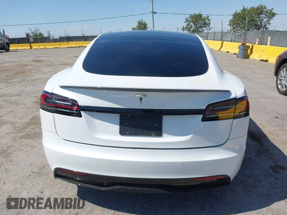 2023 Tesla Model S with VIN 5YJSA1E59PF500816, listed as a IAAI auction lot 42409049 with Not provided miles and . Bid and sale history available at DreamBid. Image 16.