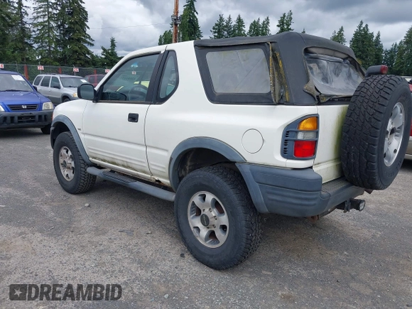 1998 Isuzu Rodeo with VIN 4S2CM57W9W4373049, listed as a IAAI auction lot 42599157 with 140,368 mi miles and . Bid and sale history available at DreamBid. Image 3.