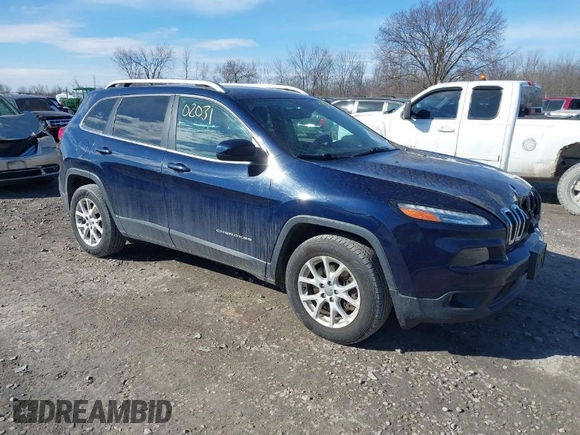 2014 Jeep Cherokee Latitude z VIN 1C4PJMCS6EW145810, wystawiony jako IAAI lot #41802031 z przebiegiem 143 358 mil mil oraz . Historia ofert i sprzedaży dostępna na DreamBid. Obrazek 1.