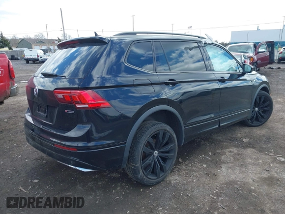2021 Volkswagen Tiguan SE with VIN 3VV2B7AX1MM101432, listed as a IAAI auction lot 41982286 with 72,252 mi miles and . Bid and sale history available at DreamBid. Image 4.