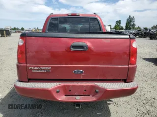 2004 Ford Explorer Sport Trac XLS with VIN 1FMDU77K74UC12586, listed as a Copart auction lot 61240815 with 96,377 mi miles and Salvage title. Bid and sale history available at DreamBid. Image 6.