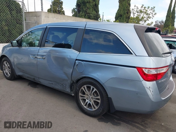 2012 Honda Odyssey EX-L with VIN 5FNRL5H60CB095086, listed as a IAAI auction lot 42251330 with 144,232 mi miles and . Bid and sale history available at DreamBid. Image 6.