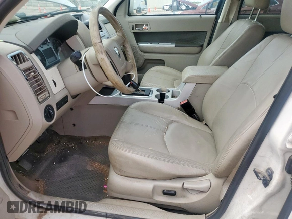 2010 Mercury Mariner Premier с VIN 4M2CN8HG7AKJ29917, выставлен на аукционе Copart как лот 63306425 с пробегом 288 075 миль миль и Списание • Salvage title. История ставок и продаж доступна на DreamBid. Изображение 7.