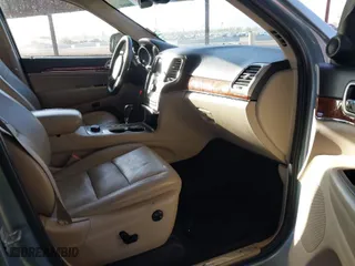 2012 Jeep Grand Cherokee Limited with VIN 1C4RJFBG2CC317363, listed as a IAAI auction lot 41689903 with 158,020 mi miles. Bid and sale history available at carsss.com. Image 5.