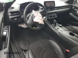 2021 Toyota GR Supra 2.0 with VIN WZ1DB2C04MW043408, listed as a Copart auction lot 49366794 with 33,453 mi miles and Salvage Title. Bid and sale history available at carsss.com. Image 8.