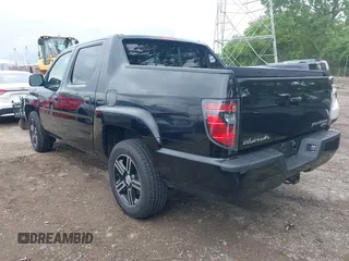 2013 Honda Ridgeline Sport with VIN 5FPYK1F73DB016232, listed as a IAAI auction lot 42330362 with 214,668 mi miles and . Bid and sale history available at DreamBid. Image 3.